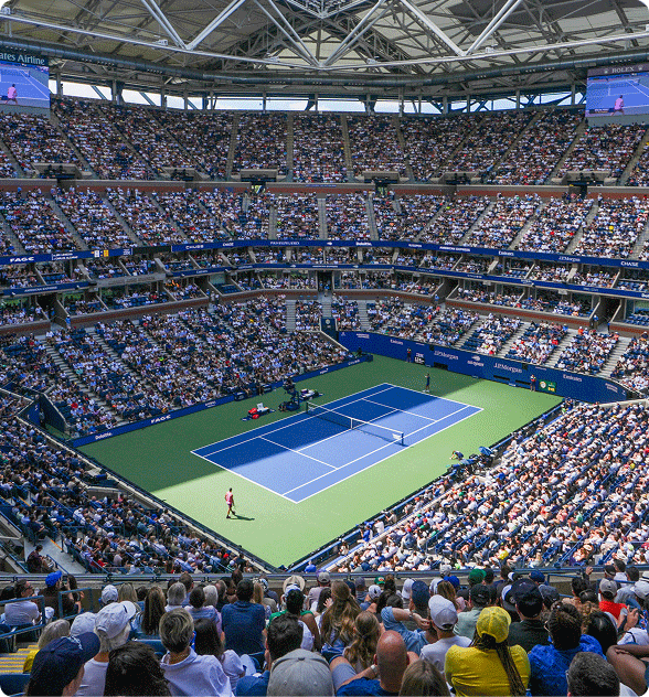 A large stadium crowd watching a US Open game