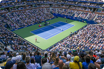 A large stadium crowd watching a US Open game