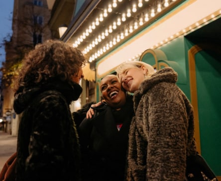 Picture of friends outside a Theater