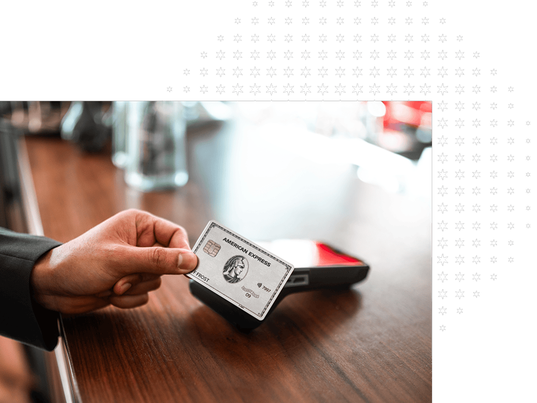 American Express Platinum Card against a tap-to-pay card reader