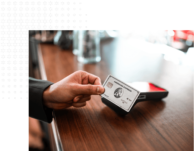 American Express Platinum Card against a tap-to-pay card reader