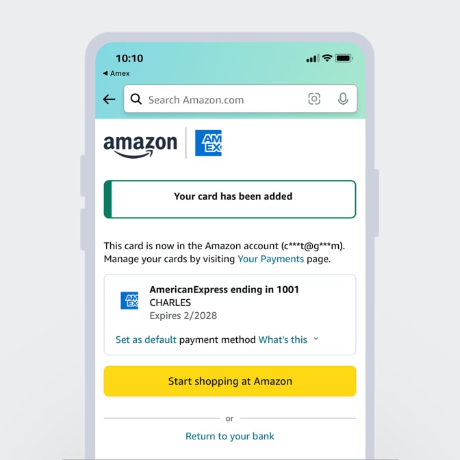 A phone screen showing a Card successfully added to Amazon.com.
