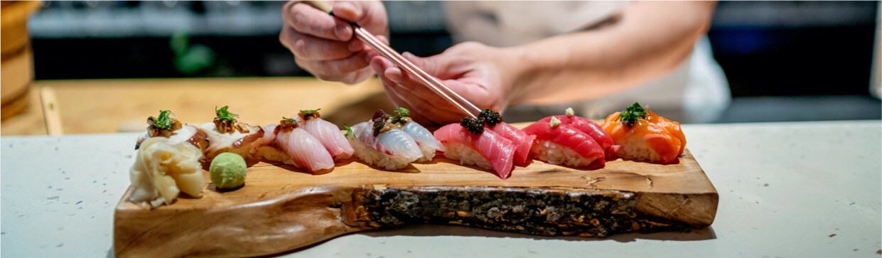 Amex premium dining experience featuring sushi