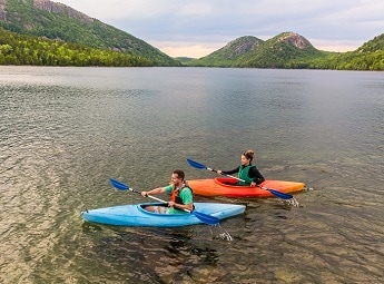 Couple Kayaking in lake