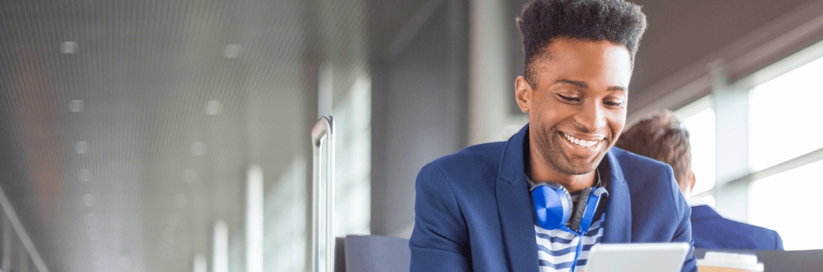 Man looking at a tablet