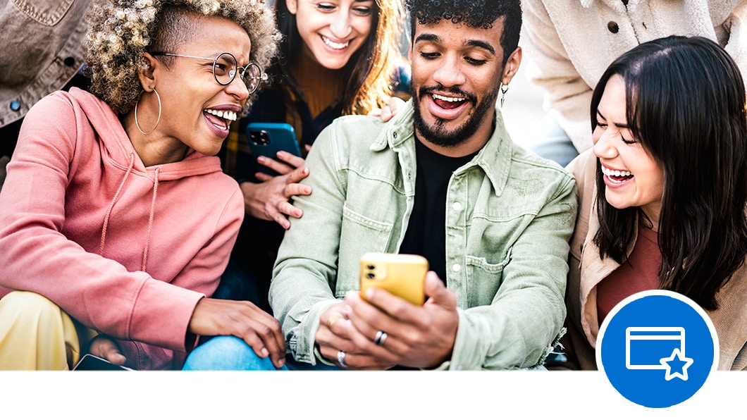 A group of employees looking at offers from American Express partners and a card icon.