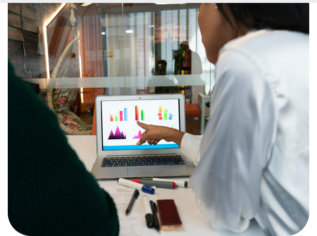 People looking at data on a screen