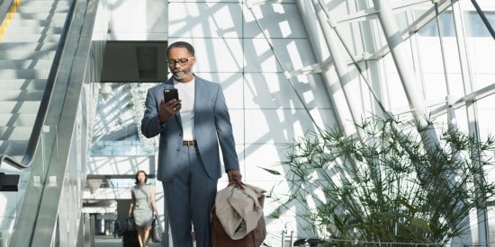 Use Amex GBT to book business and corporate travel