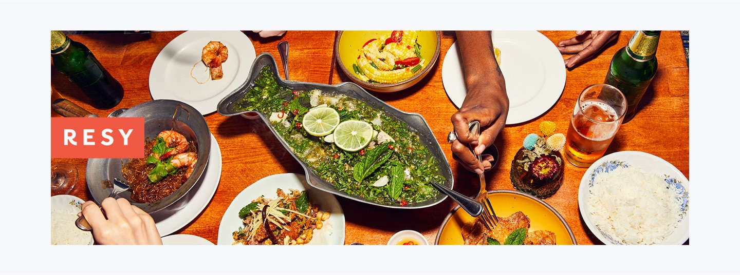 Bird’s-eye view of a tablescape with various entrees. 