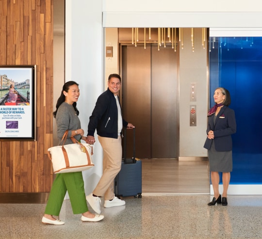 Business man sitting in an aiport lounge