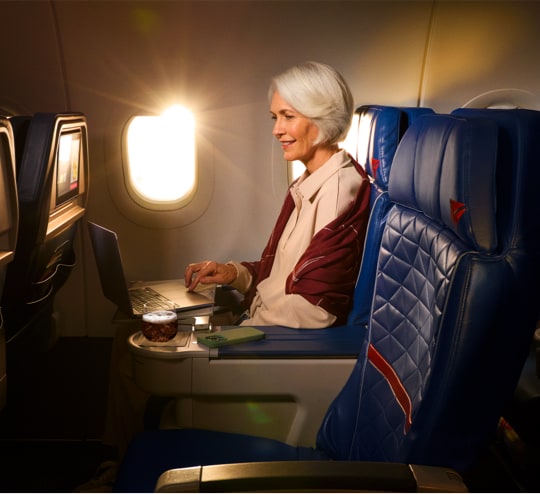 Business women sitting in an airport lounge
