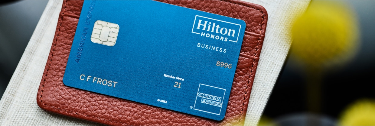 Man talking on the phone while working from home office.