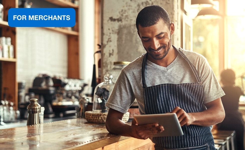 A merchant using a device with an AI agent.