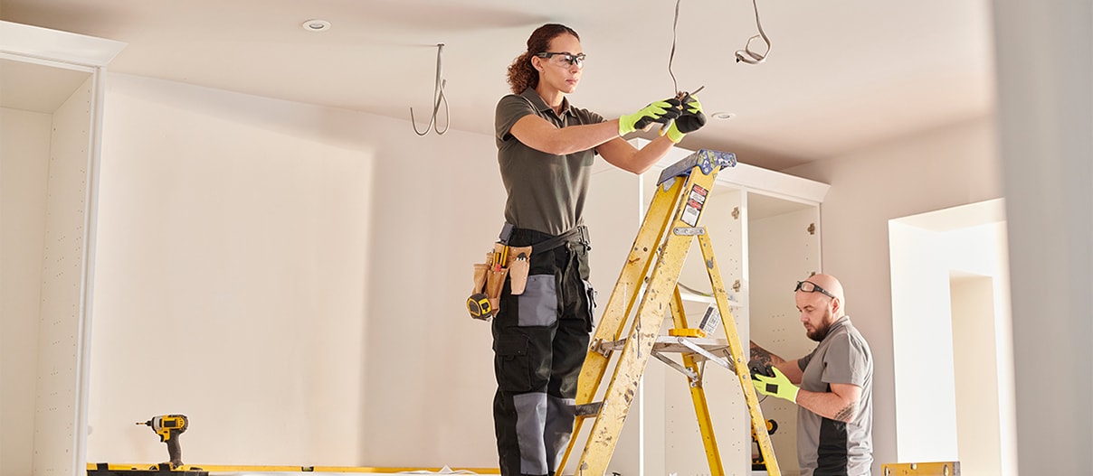 Two electricians at work