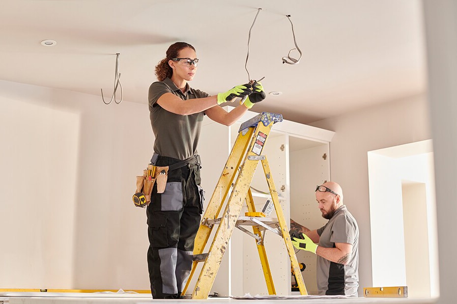 Two electricians at work