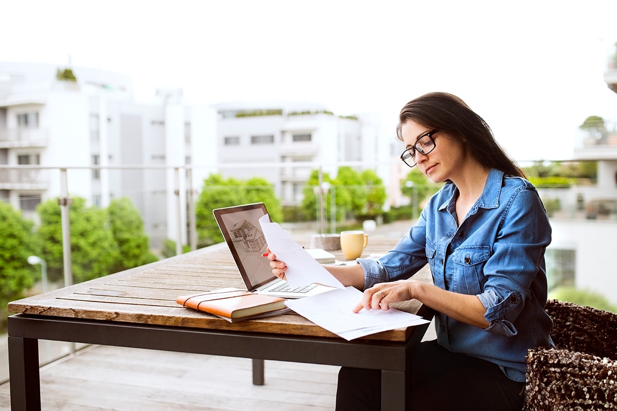 Someone looking at a computer screen or papers.
