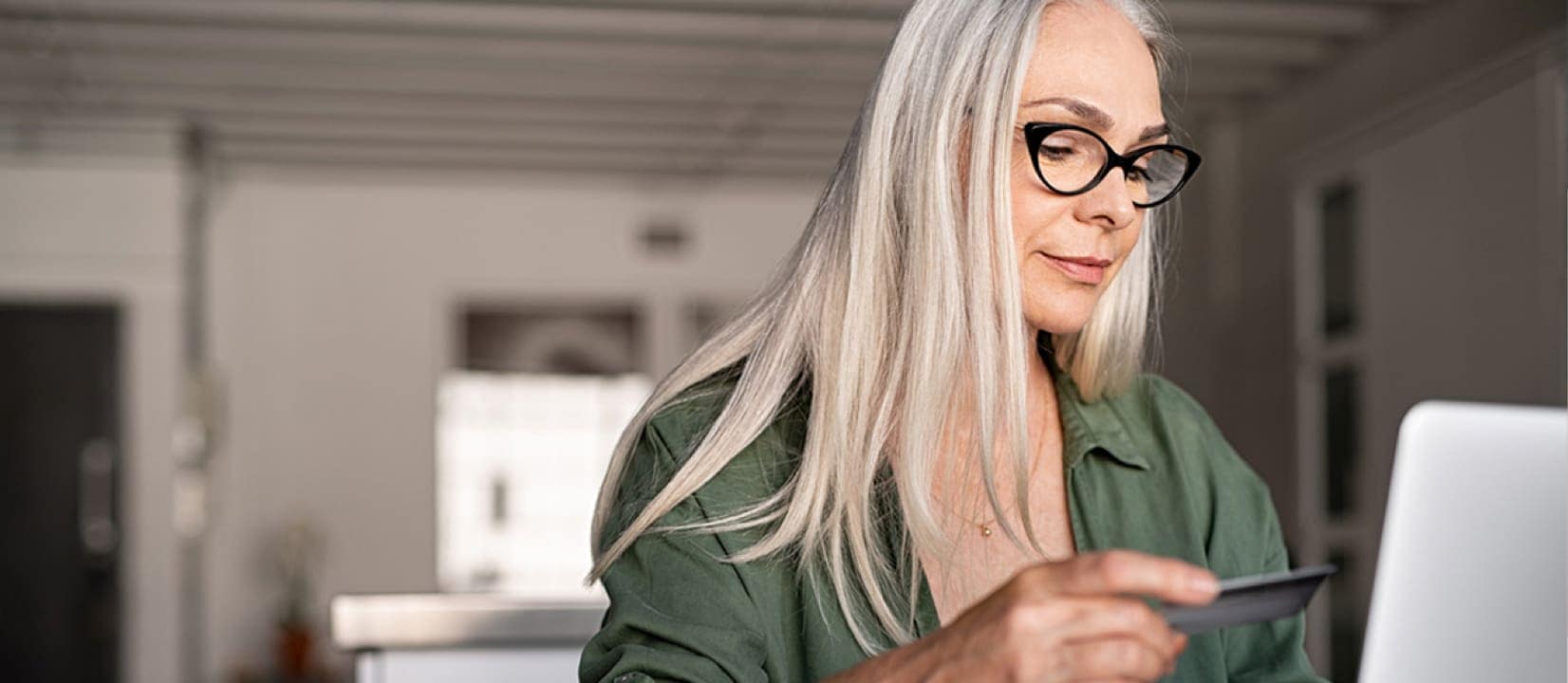 A Women Using a Credit Card