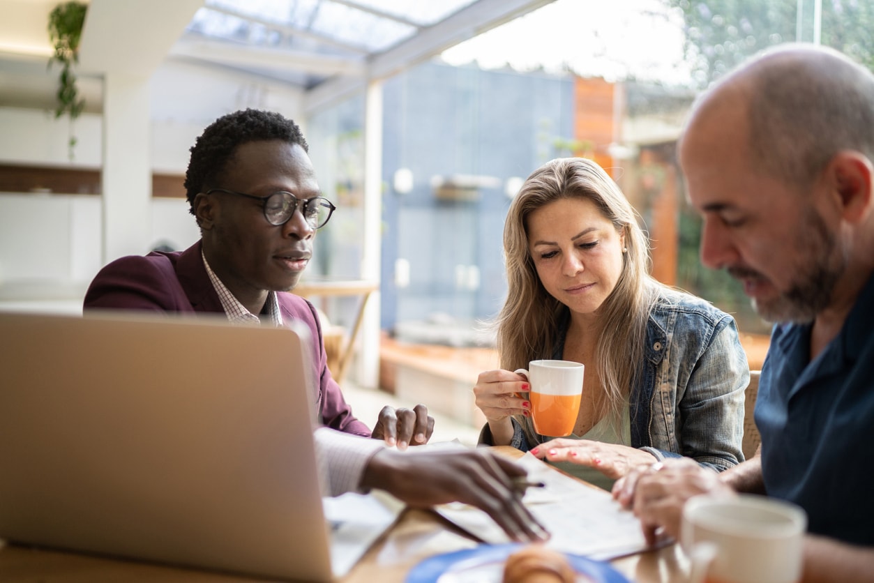 A group of people having a brunch meeting