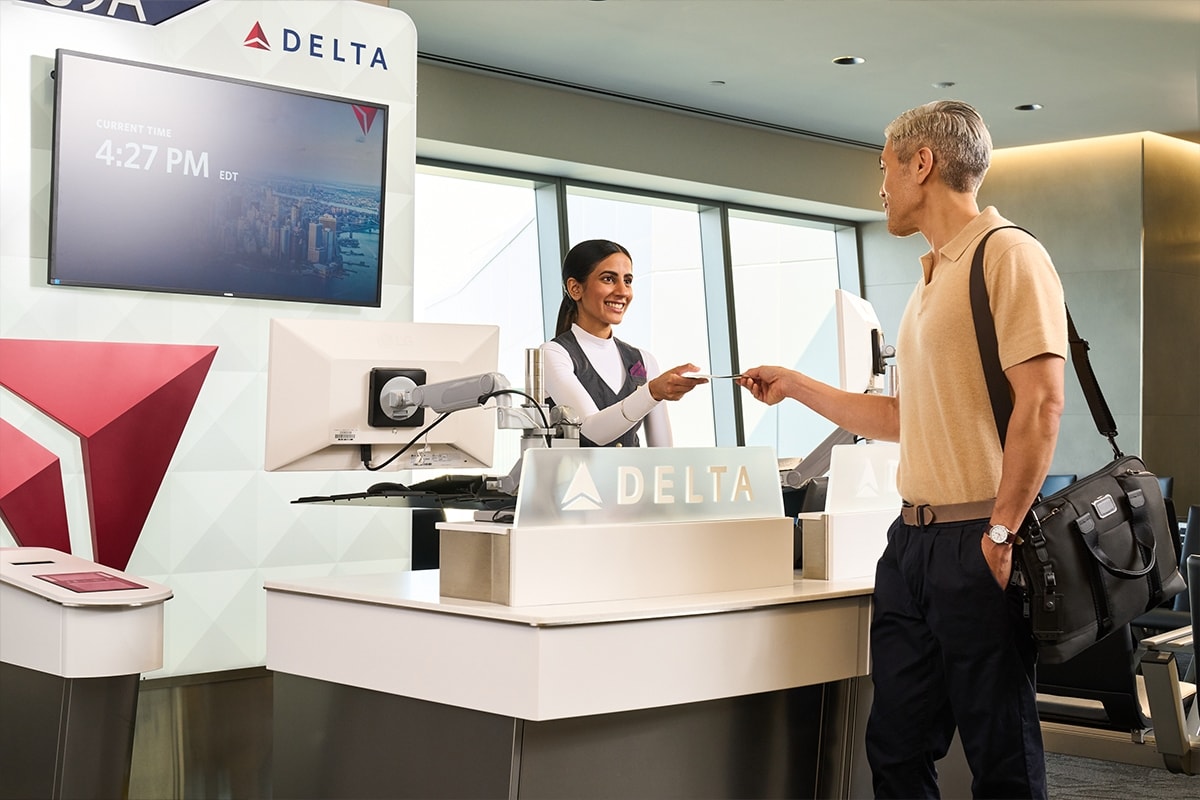 A traveler in a Delta terminal, or a Delta airplane.