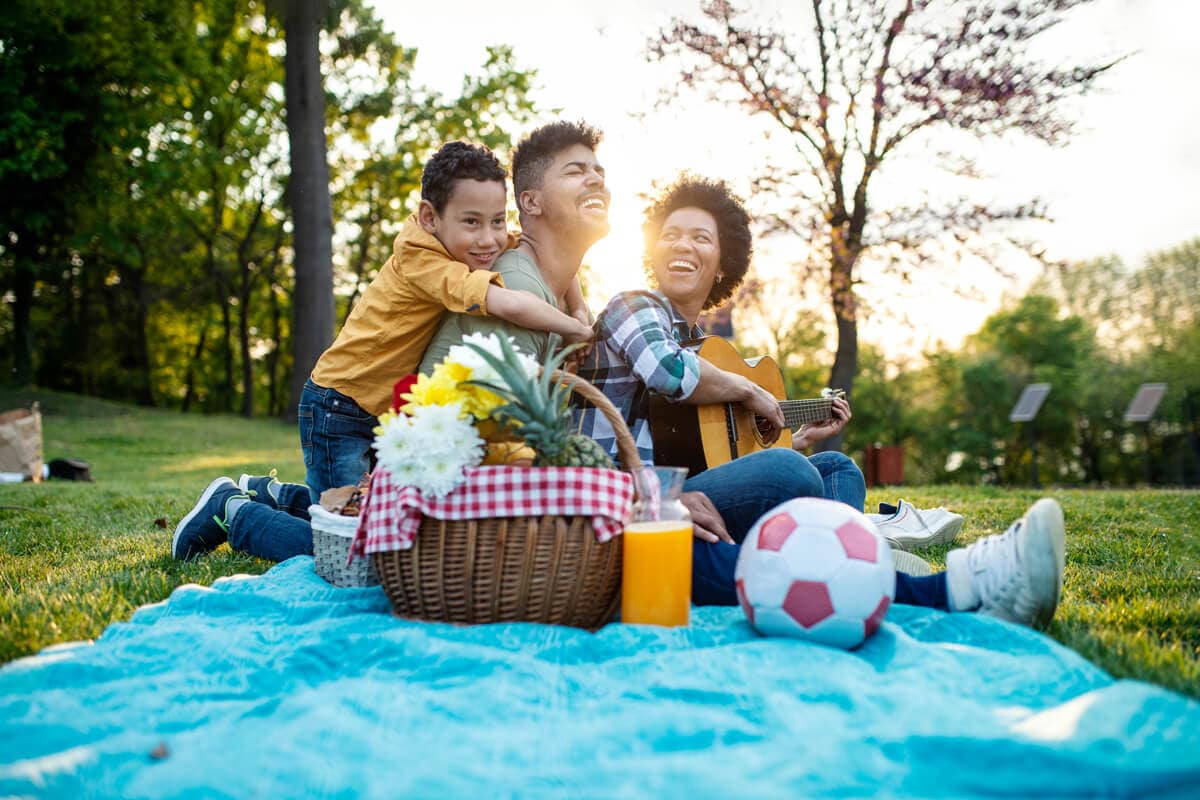 Family going on a picnic in the park.