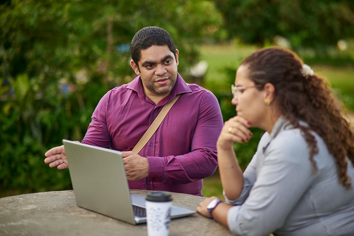 Someone writing a check