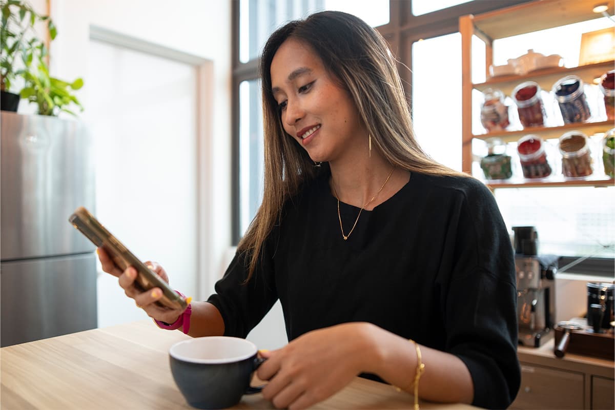 Someone making an online credit card payment via a smartphone.