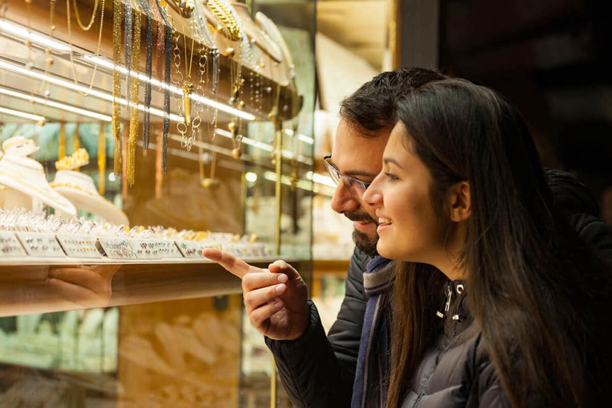 A person window shopping.