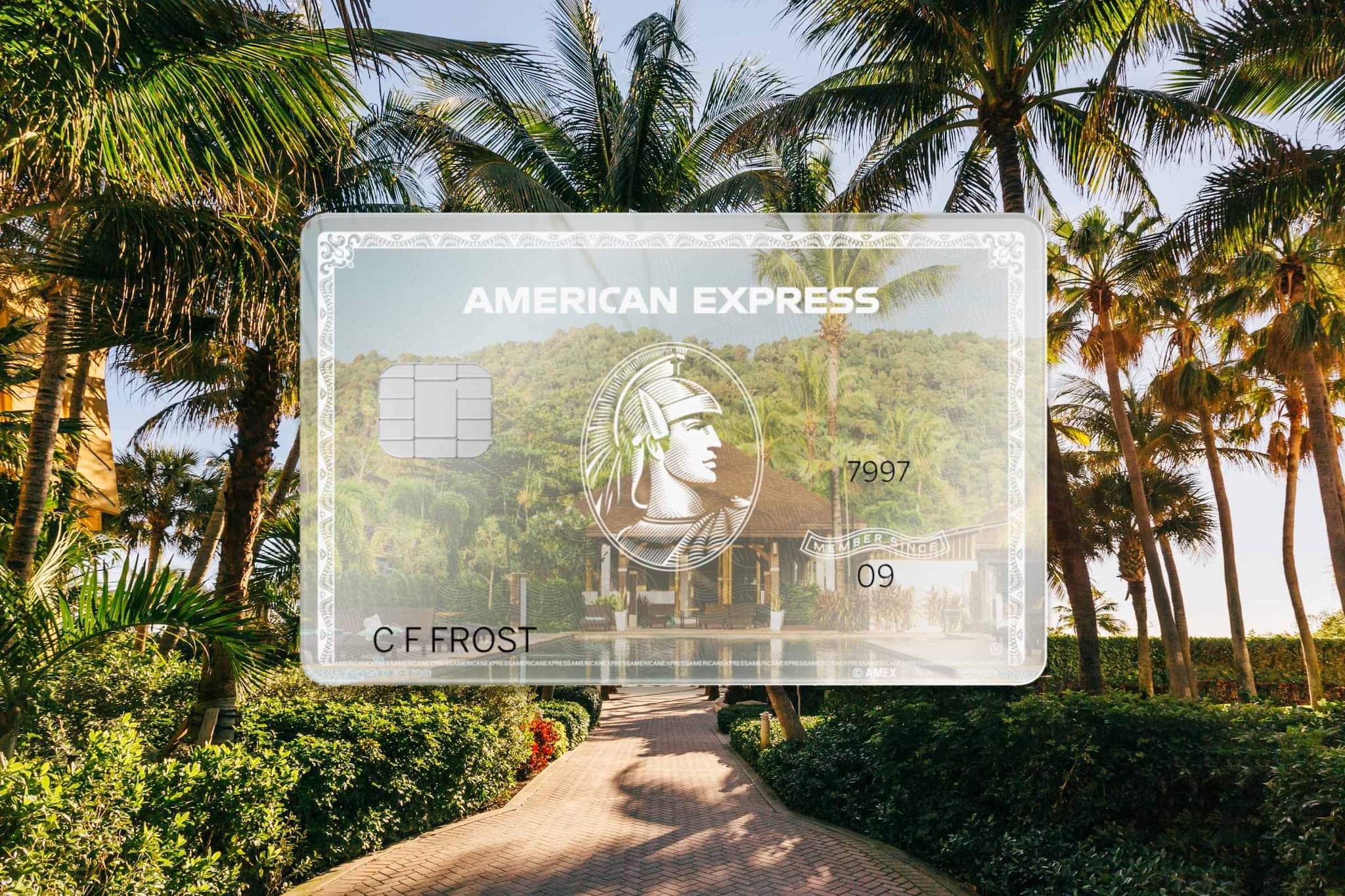 Platinum AMEX credit card is laying on the table with two coffee cups