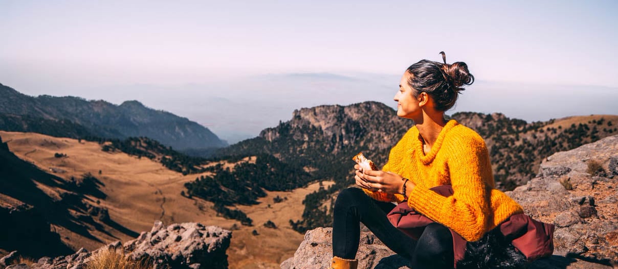 A woman traveling solo and enjoying nature
