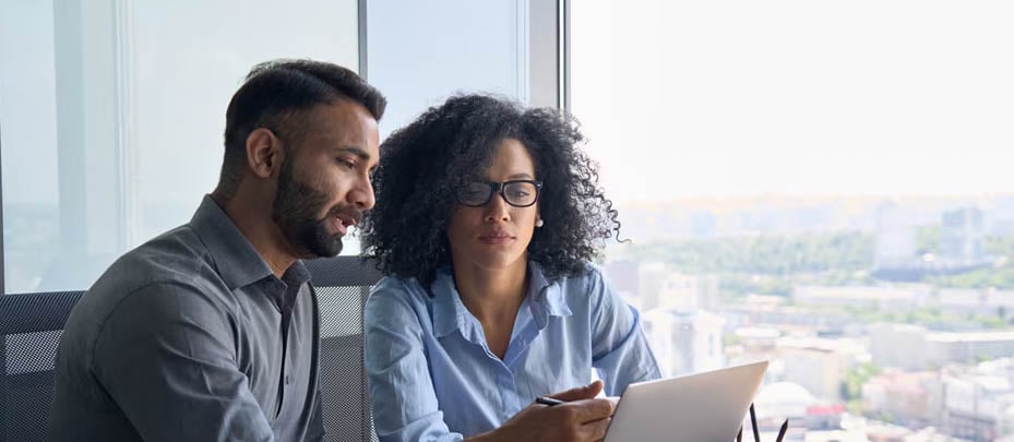 Two individuals discussing about the types of investment funds.