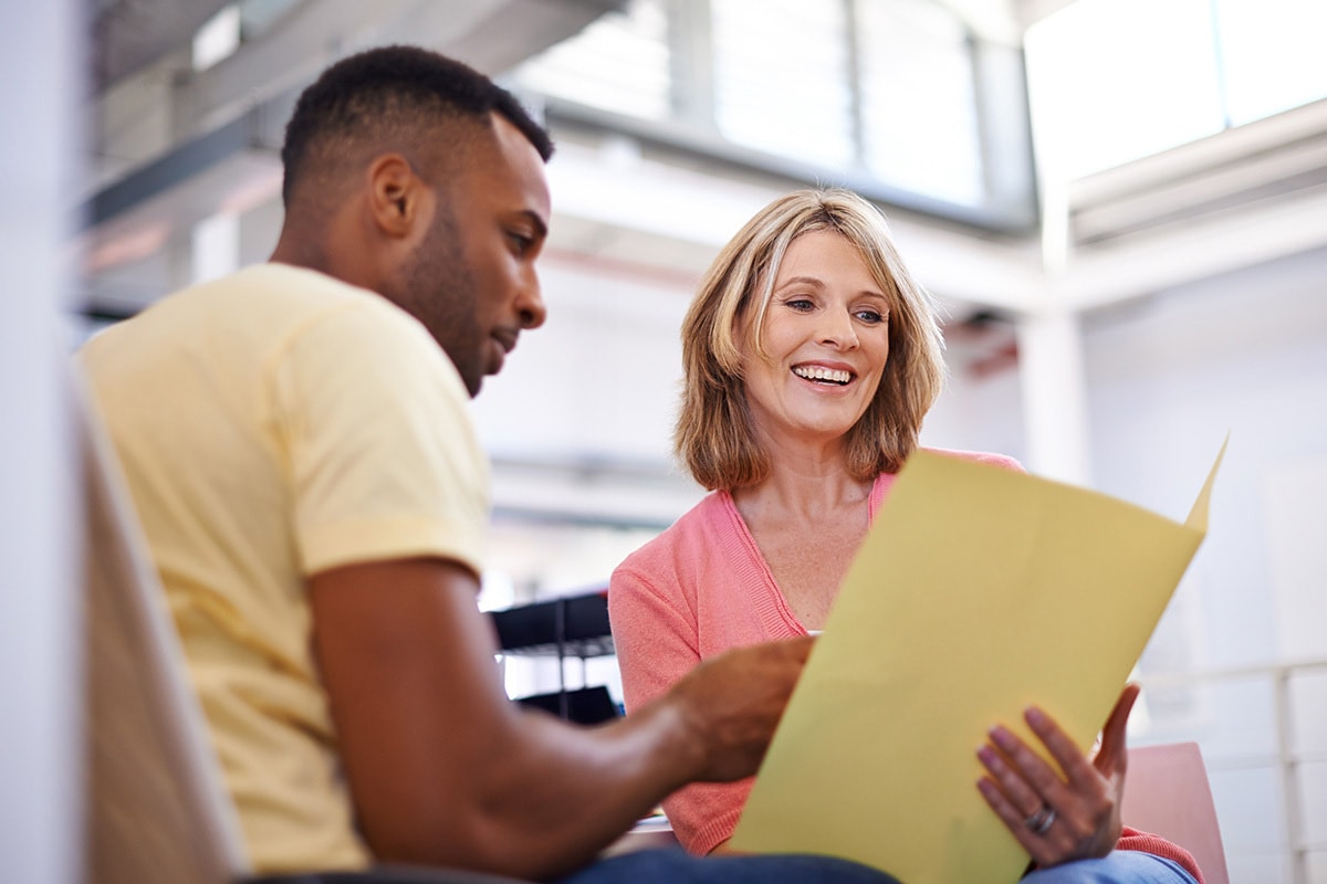 A person discussing about points on a mortgage with a lender