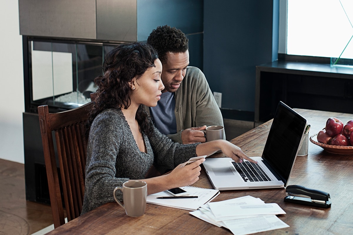 Someone reviewing their credit card statement