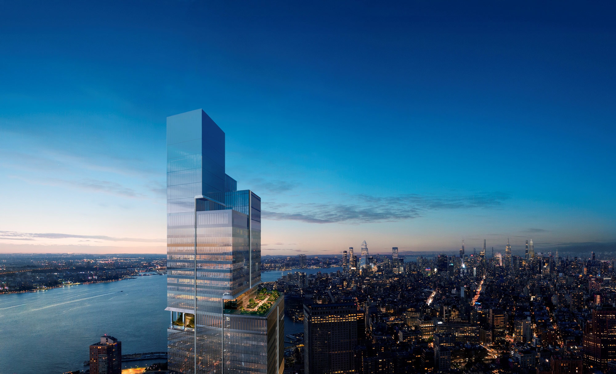 A rendering showing the new American Express headquarters at dusk.