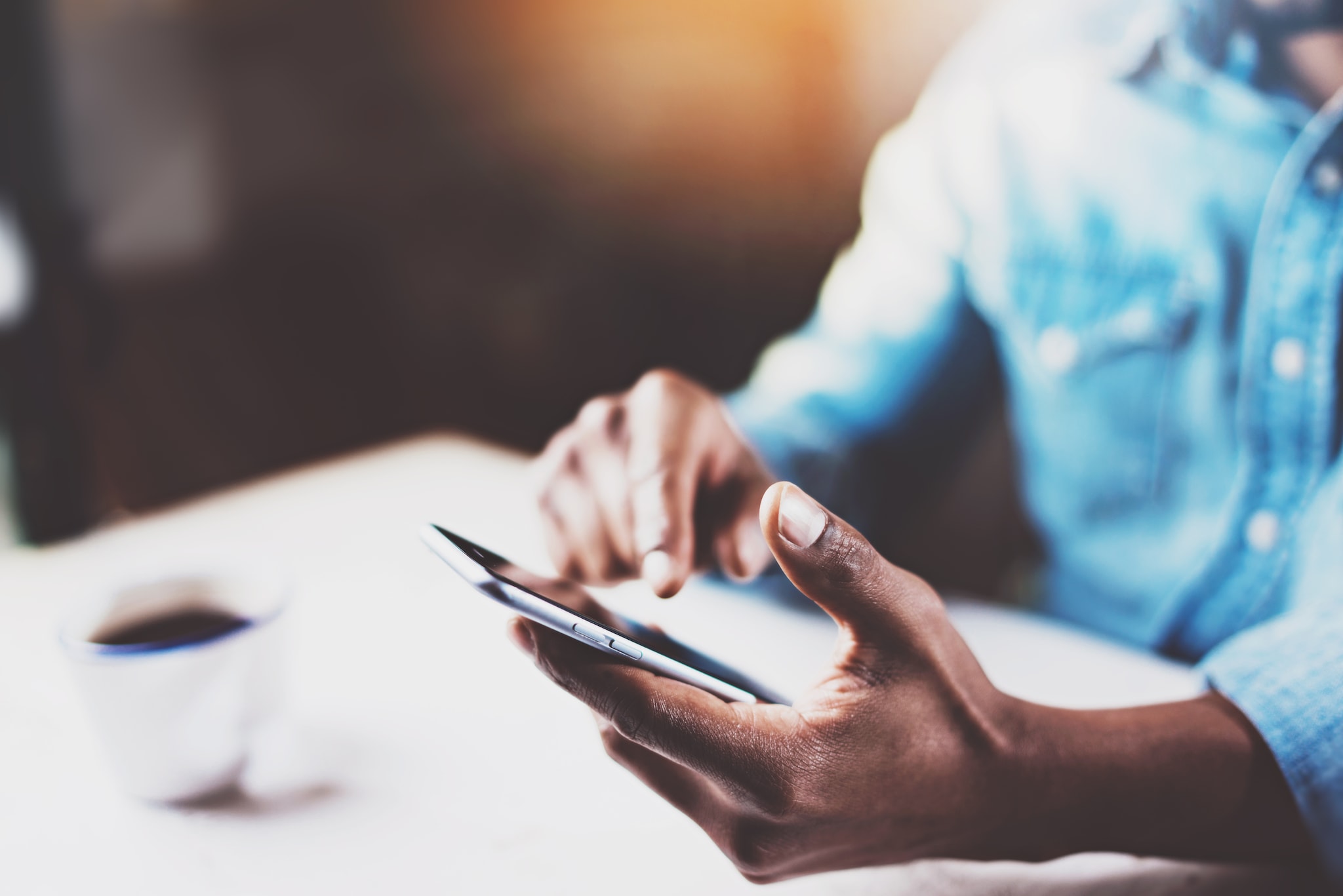 Man setting up notifications on the phone 