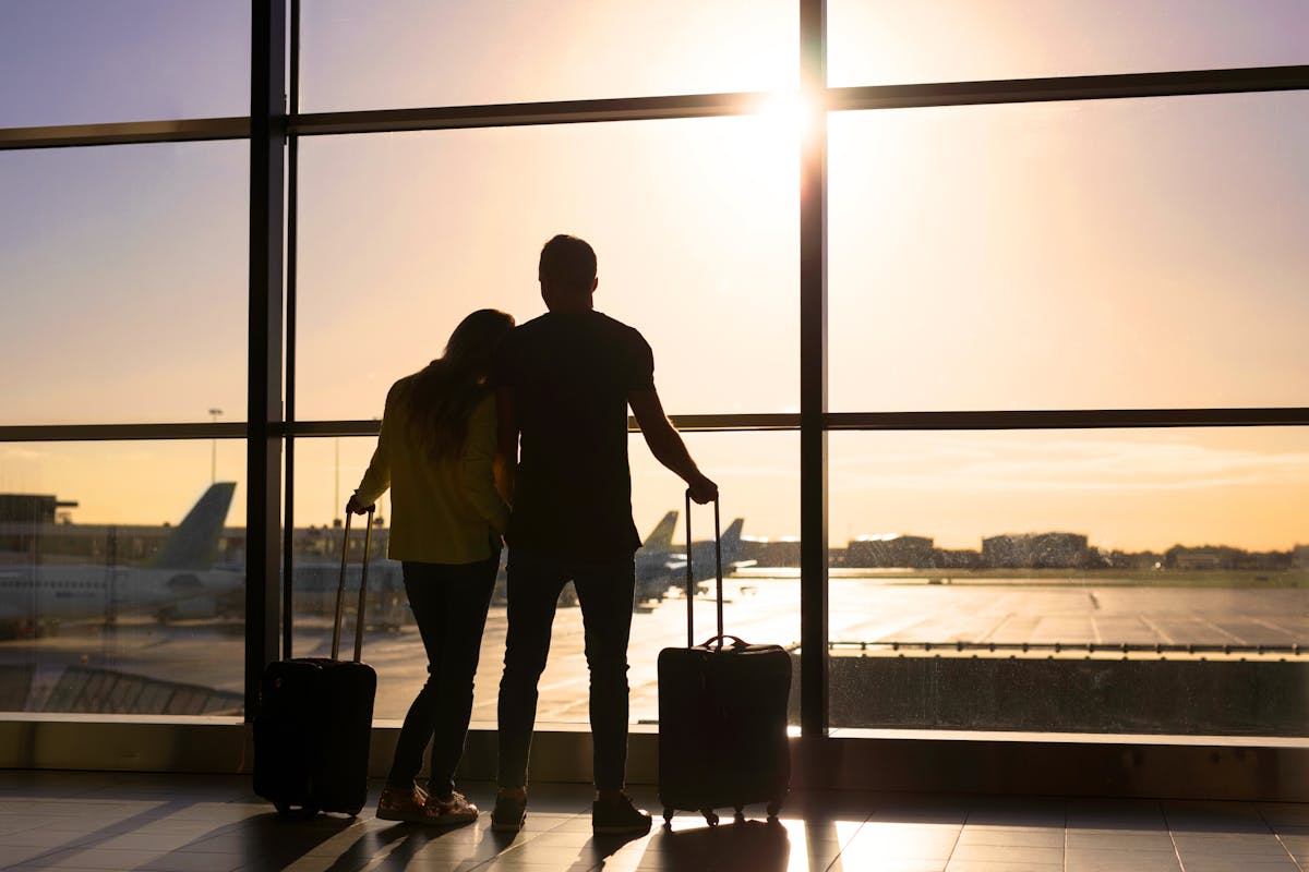 A couple's silhouette at airport