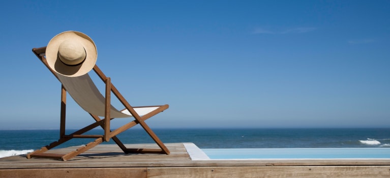 Beach chair overlooking horizon