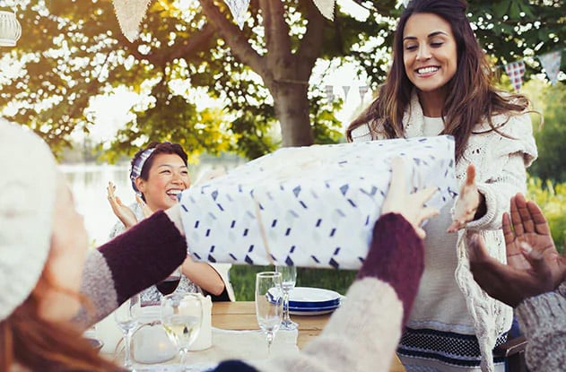 Woman passing gift