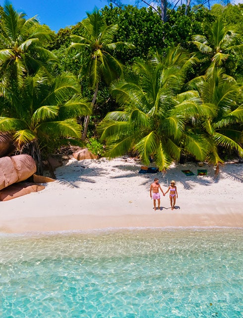 2 persons on a beach