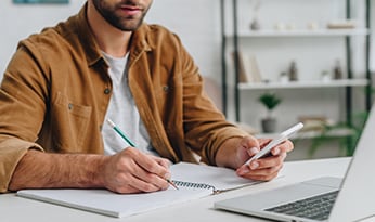 man working on laptop