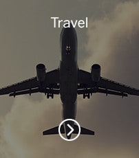 Plane flying below clouds