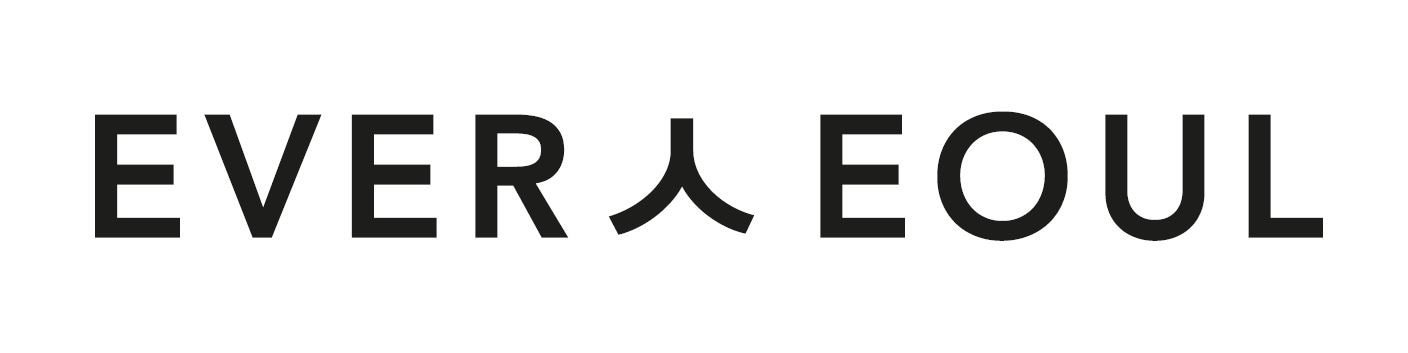 Woman smelling spices in a store