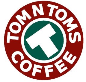 Woman smelling spices in a store