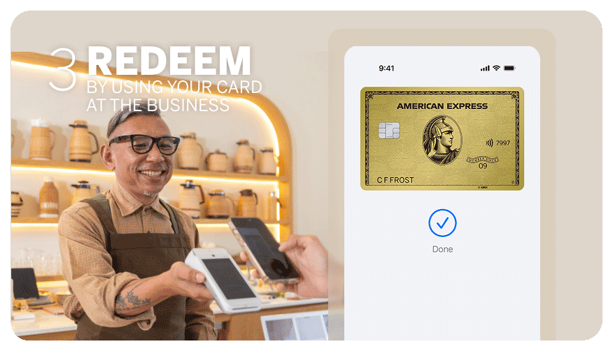 Image of shop keeper presenting a payment terminal to a customer.