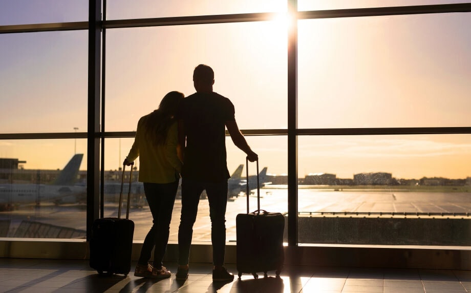 couple watching sunset at an airport