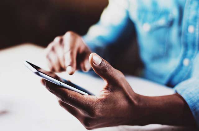 Woman and man paying bill