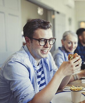 man with cheeseburger