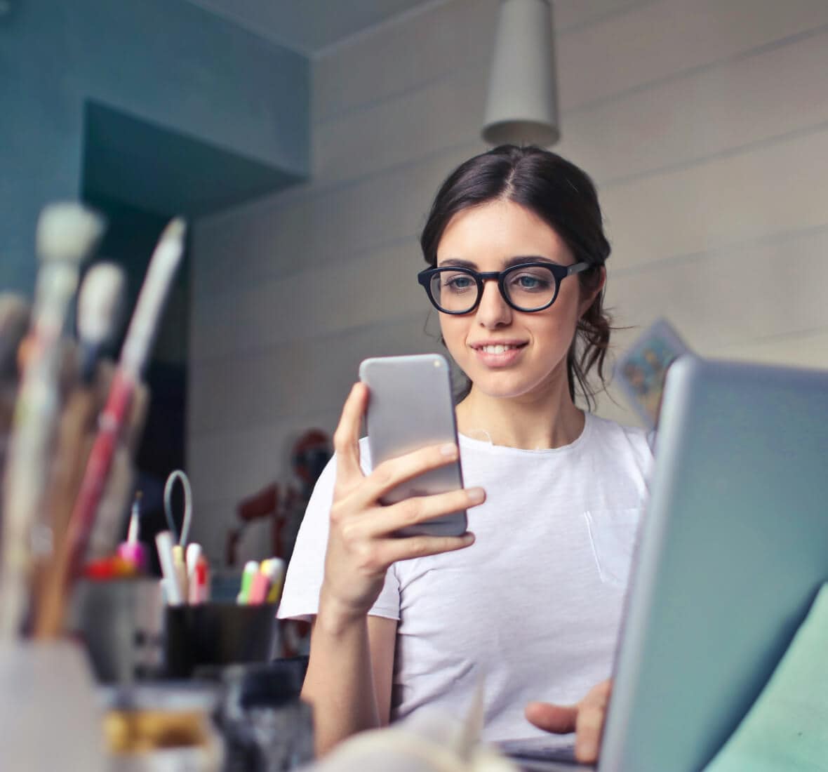 Person holding smart phone