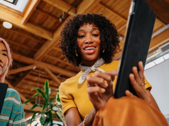 Woman using tablet device