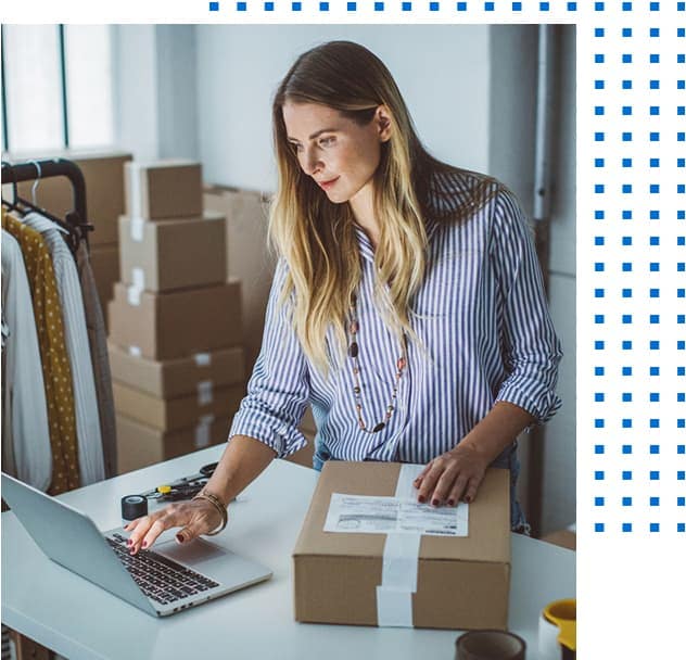 Person using a laptop to fulfill an order