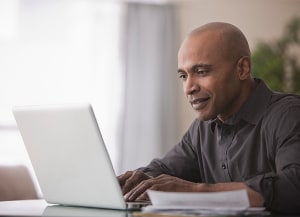 Person looking at laptop screen
